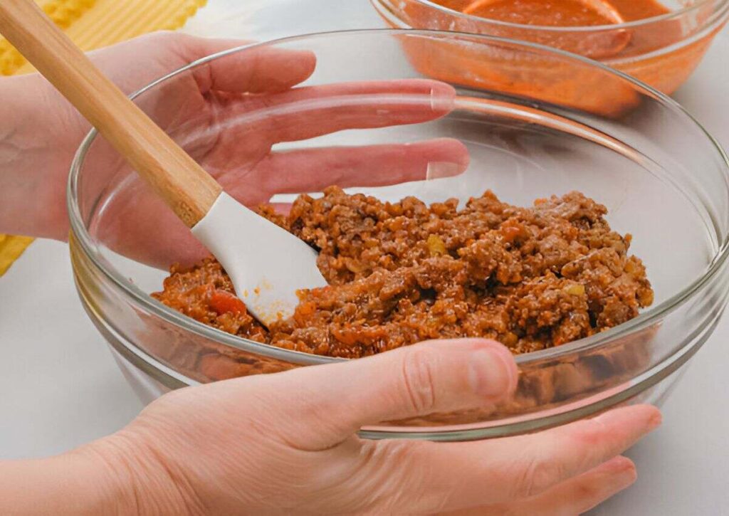 Combine Breadcrumbs, tomato paste, oregano & mince